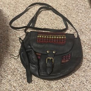 Gently used black Roxy bag